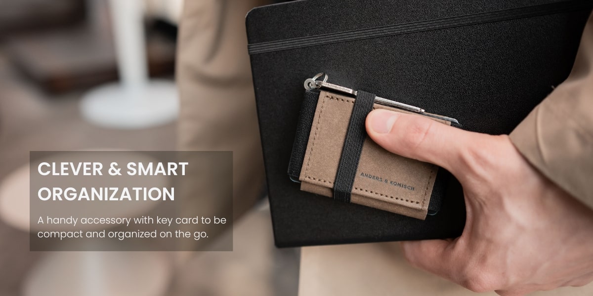 minimal wallet with a key chain and a journal business look